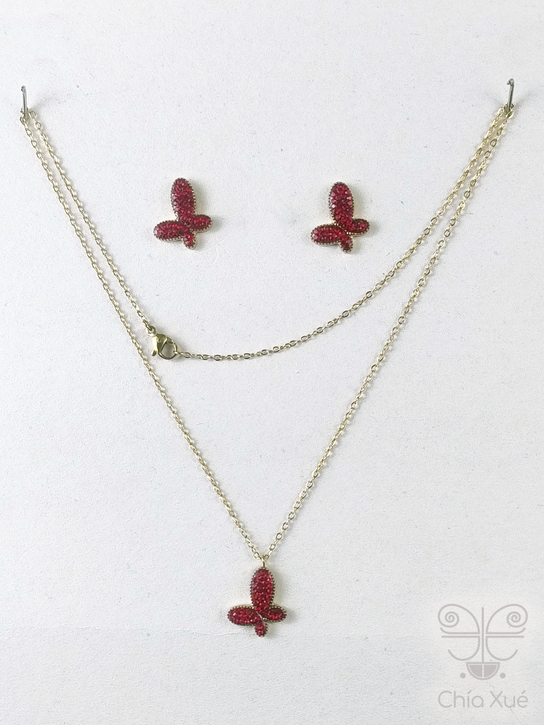 Set de collar y aretes mariposa