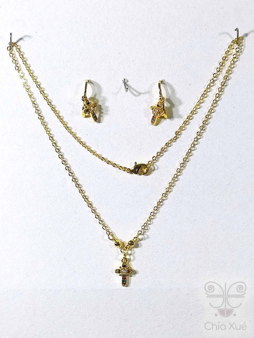 Set de collar y aretes de cruz